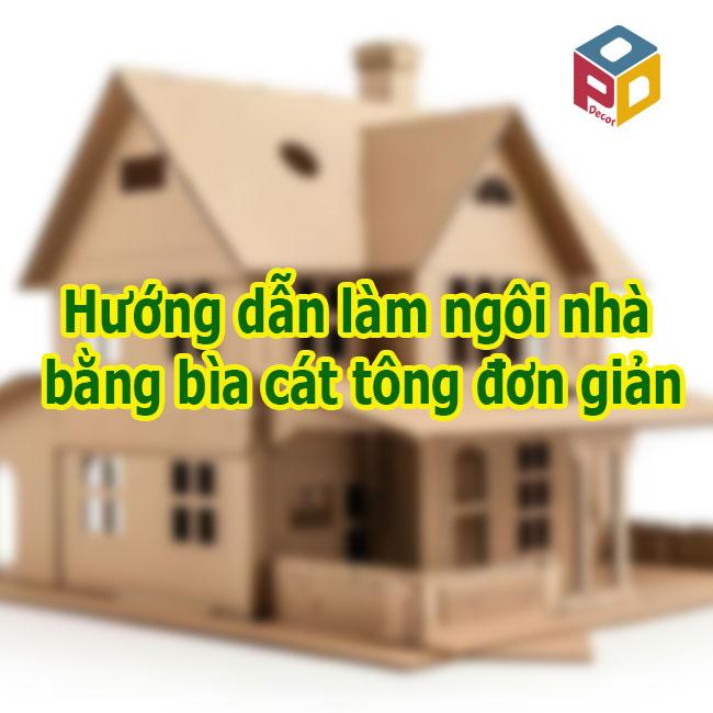 Một ngôi nhà đồ chơi làm bằng bìa cát tông đã hoàn thiện và trang trí đầy màu sắc
