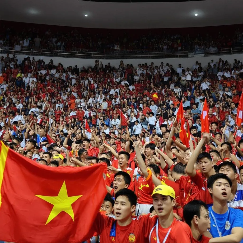 Cổ động viên hò reo cổ vũ cho đội tuyển futsal Việt Nam